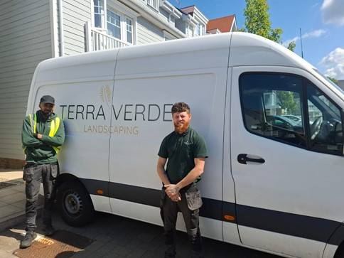 Terra Verde team with a company van